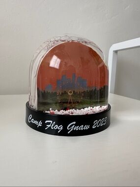 Camp Flog Gnaw snow globe featuring the iconic Los Angeles skyline